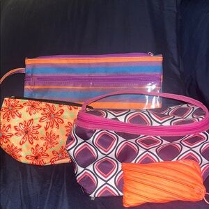 Clinique Floral Print ans Multi-Pouch Cosmetic Set in Pink, Orange & Purple
